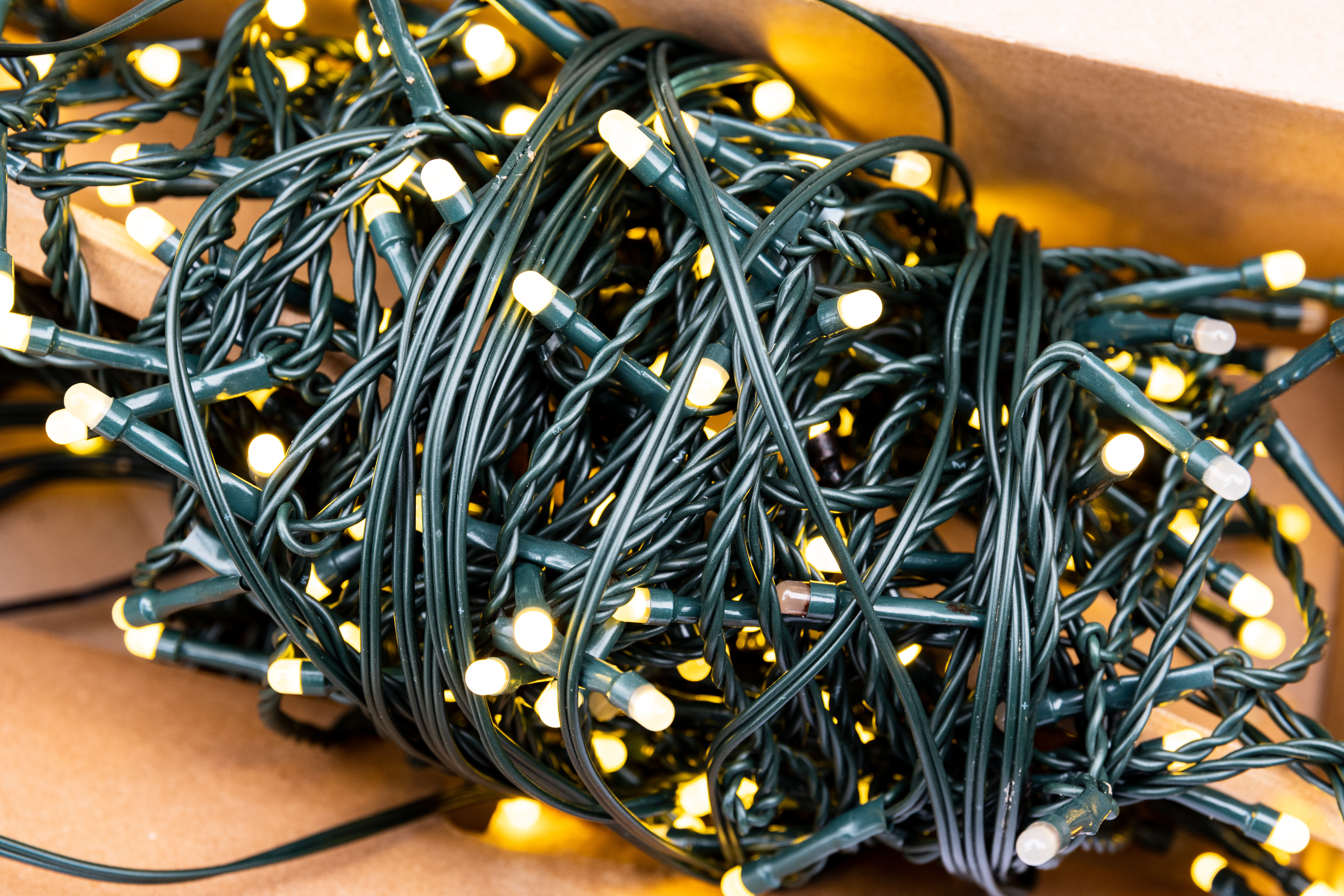 Holiday lights wound up, ready to be hung for the season - For Virginia Beach Christmas house lights installation, contact Window Ninjas.