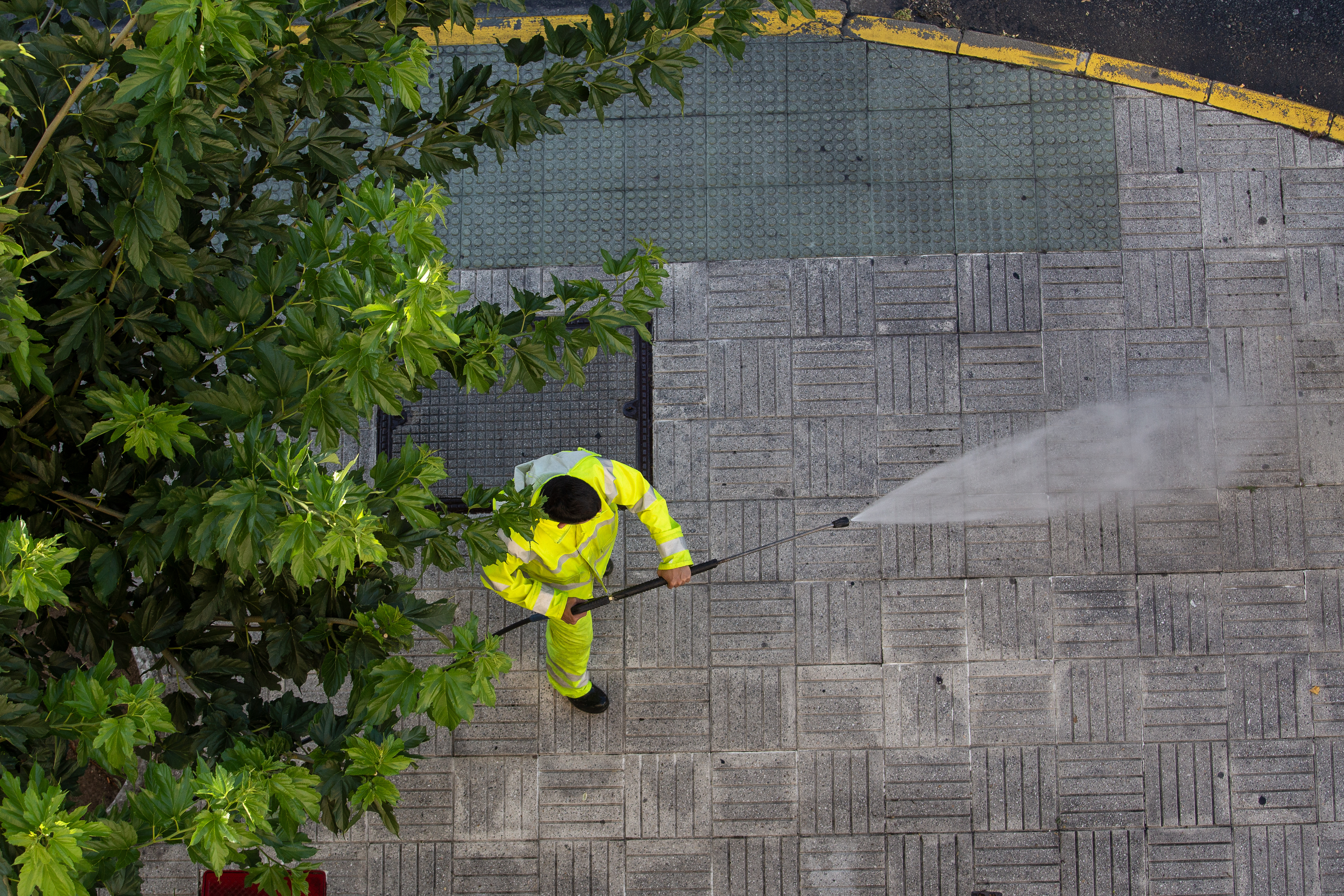 A professional providing expert concrete and exterior power washing services.