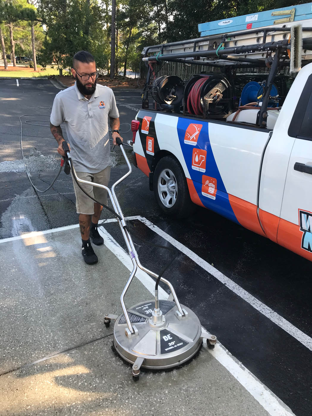 A Window Ninjas Greenville / Spartanburg professional providing concrete / driveway power washing services.