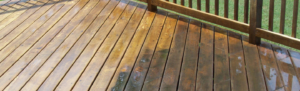 before and after deck soft washing