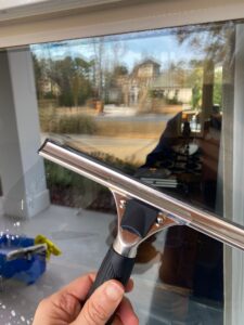 art of window cleaning squeegee