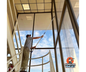 interior window cleaning with extension pole
