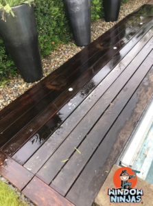 wet wood from pressure washing