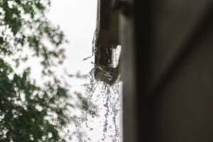 overflowing gutters dangerous to let leaves sit in gutters